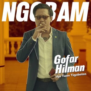 Dengarkan lagu Ngobam - Upi Tuan Tigabelas nyanyian Gofar Hilman dengan lirik
