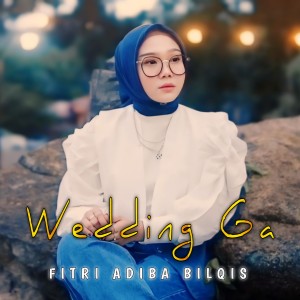 Dengarkan lagu Wedding Ga nyanyian Fitri Adiba Bilqis dengan lirik