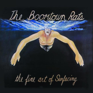 ดาวน์โหลดและฟังเพลง Someone's Looking At You พร้อมเนื้อเพลงจาก The Boomtown Rats