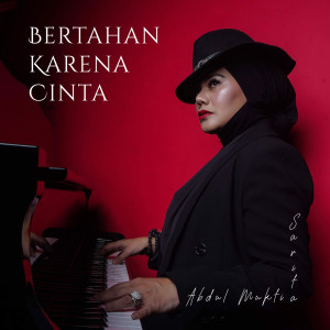 Dengarkan lagu Bertahan Karena Cinta (Indonesia) nyanyian Sarita Abdul Mukti dengan lirik