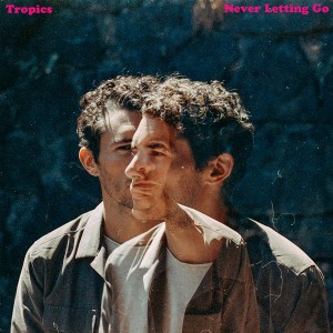 ดาวน์โหลดและฟังเพลง Never Letting Go พร้อมเนื้อเพลงจาก Tropics