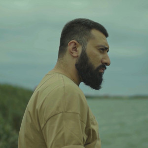 Listen to Həmin Adam song with lyrics from Miro