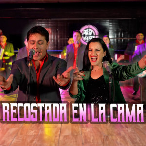 收聽Grupo Trinidad的Recostada en la Cama (Se Cansó de Esperar)歌詞歌曲