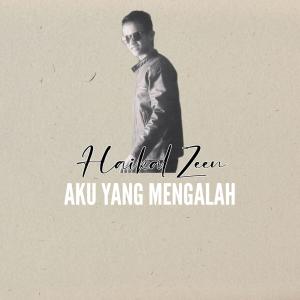 Dengarkan lagu Aku Yang Mengalah nyanyian Haikal Zeen dengan lirik