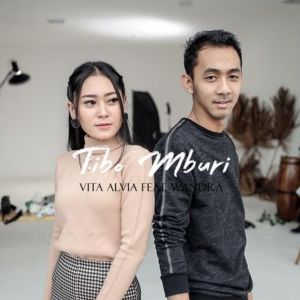 Dengarkan Tibo Mburi Feat. Wandra lagu dari Vita Alvia dengan lirik