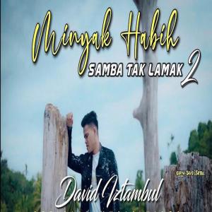 Dengarkan lagu Minyak Habih Samba Tak Lamak 2 nyanyian David Iztambul dengan lirik