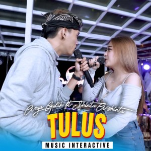 Listen to Tulus song with lyrics from Arya Galih
