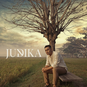 Dengarkan lagu Bagaimana Kalau Aku Tidak Baik Baik Saja nyanyian Judika dengan lirik