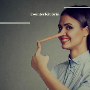 收聽Saina的Counterfeit Grin歌詞歌曲