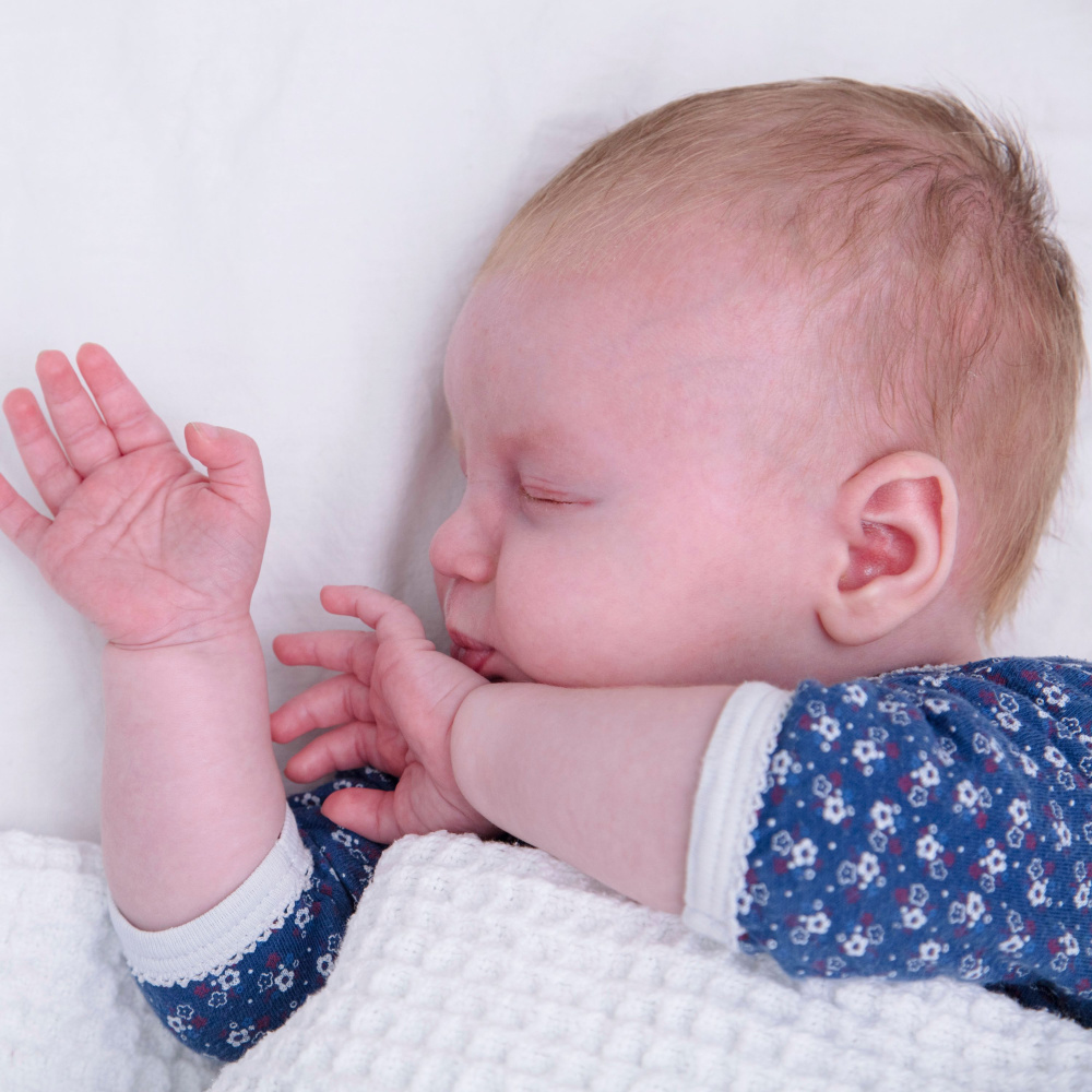 Baby's Slumber in the Ocean's Whisper