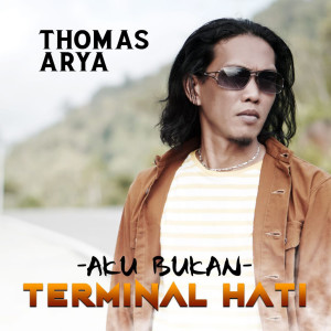 Dengarkan Aku Bukan Terminal Hati lagu dari Thomas Arya dengan lirik