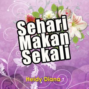 Dengarkan lagu Cinta Berkarat nyanyian Heidy Diana dengan lirik