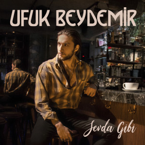 Listen to Ay Tenli Kadın song with lyrics from Ufuk Beydemir