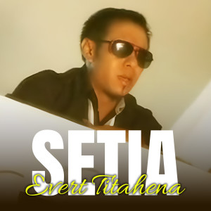 Listen to SETIA song with lyrics from Evert Titahena