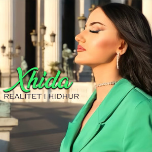 Dengarkan lagu Realitet i hidhur nyanyian Xhida dengan lirik