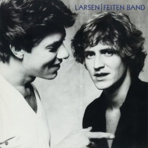 收聽Larsen-Feiten Band的She's Not in Love (Album Version)歌詞歌曲