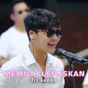 Listen to MEMILIH LEPASKAN (Live) song with lyrics from Tri Suaka
