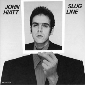 ดาวน์โหลดและฟังเพลง You're My Love Interest (Album Version) พร้อมเนื้อเพลงจาก John Hiatt