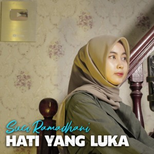 Dengarkan lagu Hati Yang Luka nyanyian Suci Ramadhani dengan lirik