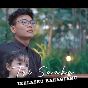 Dengarkan lagu Ikhlasku Bahagiamu nyanyian Tri Suaka dengan lirik