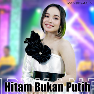 Listen to Hitam Bukan Putih song with lyrics from Tasya Rosmala