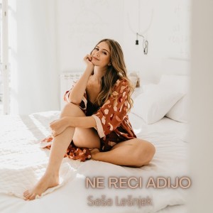 Listen to Ne reci adijo song with lyrics from Sasa Lesnjek