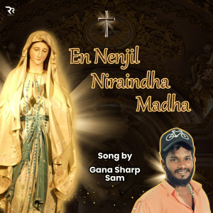 Listen to En Nenjil Niraindha Madha song with lyrics from Gana Sharp Sam