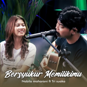 Dengarkan lagu BERSYUKUR MEMILIKIMU nyanyian Nabila Maharani dengan lirik