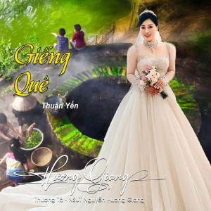 Listen to Giếng Quê song with lyrics from NSƯT Hương Giang