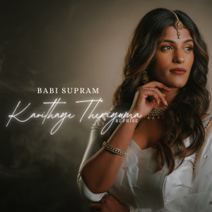 Dengarkan lagu Kavithaye Theriyuma Reprise nyanyian Babi supram dengan lirik