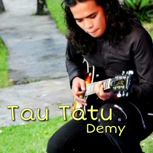 Dengarkan Tau Tatu lagu dari Demy dengan lirik