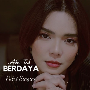 Listen to Aku Tak Berdaya song with lyrics from Putri Siagian