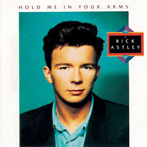 收聽Rick Astley的Hold Me in Your Arms歌詞歌曲