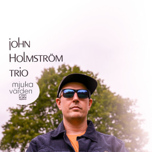 收聽John Holmström Trio的Barnös Kamp歌詞歌曲