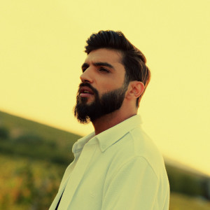Listen to Təsadüf song with lyrics from Etimat