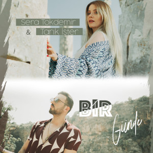 Dengarkan Bir Günde lagu dari Sera Tokdemir dengan lirik