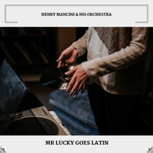 Henry Mancini & His Orchestra的專輯Mr Lucky Goes Latin