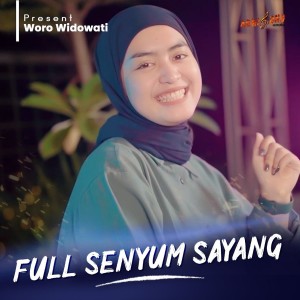 Dengarkan Full Senyum Sayang lagu dari Woro Widowati dengan lirik