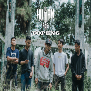 Dengarkan Topeng lagu dari The Human Ras dengan lirik