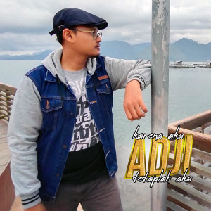 Listen to Karena Aku Tetaplah Aku song with lyrics from Adji