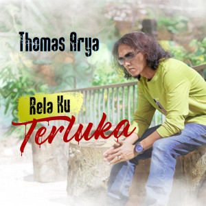 Dengarkan Rela Ku Terluka lagu dari Thomas Arya dengan lirik