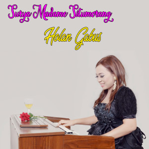 收聽Surya Madame Situmorang的Holan Gabus歌詞歌曲