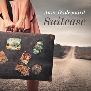 收聽Anne Gadegaard的Suitcase歌詞歌曲
