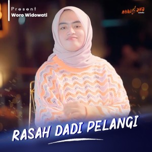 Dengarkan RASAH DADI PELANGI lagu dari Woro Widowati dengan lirik