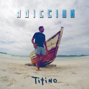 Listen to Adicción song with lyrics from Titino