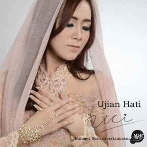 Dengarkan lagu Ujian Hati nyanyian Uci dengan lirik