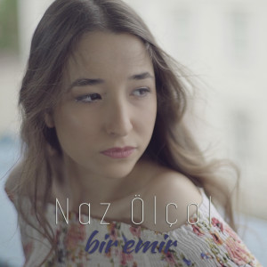 ดาวน์โหลดและฟังเพลง Bir Emir พร้อมเนื้อเพลงจาก Naz Ölçal