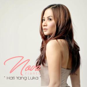 Listen to Hati Yang Luka song with lyrics from Nova Rianty