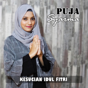 Dengarkan Kesucian Idul Fitri lagu dari Puja Syarma dengan lirik