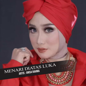 Listen to Menari Diatas Luka song with lyrics from Anisa Rahma